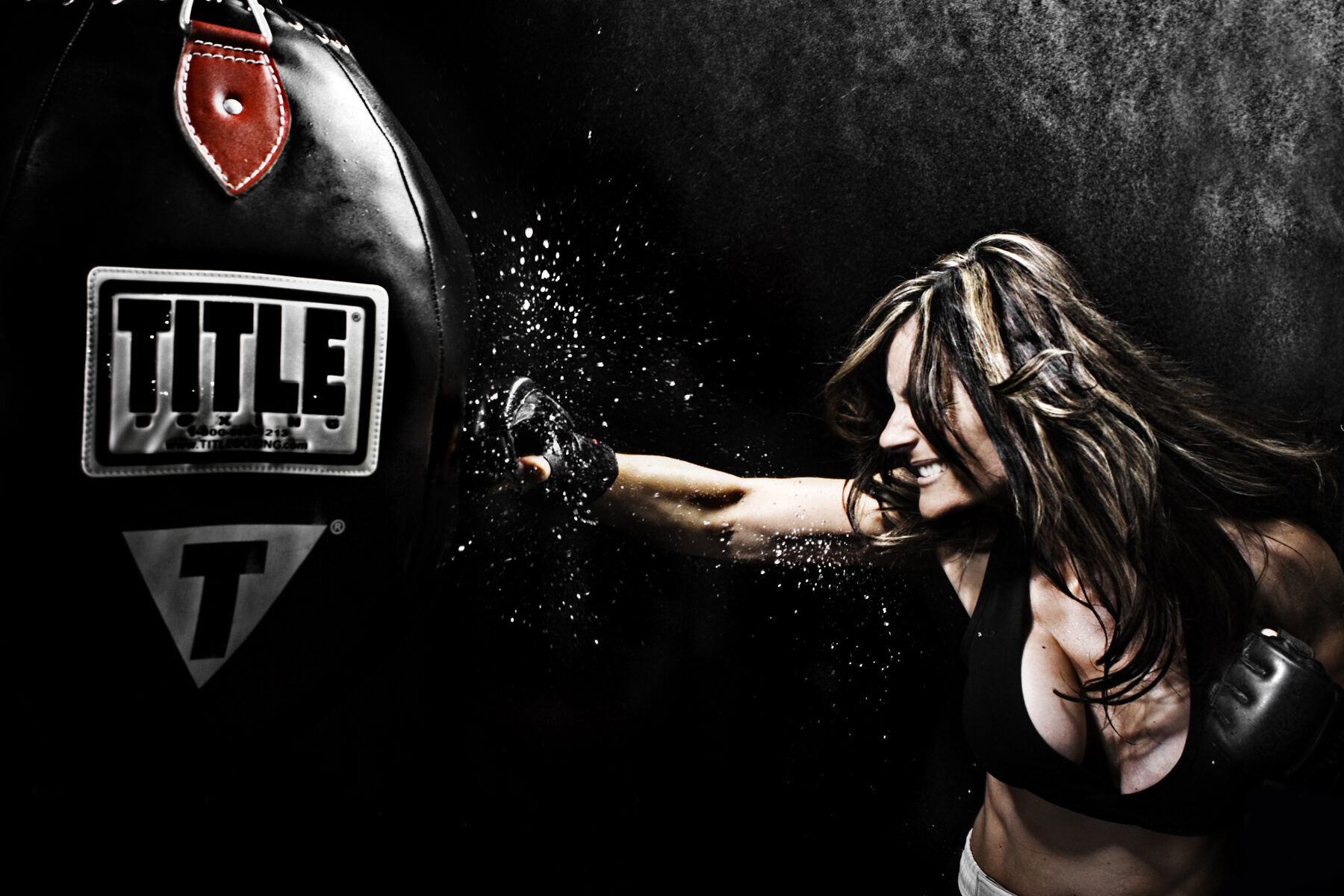 Fighter hitting heavy bag