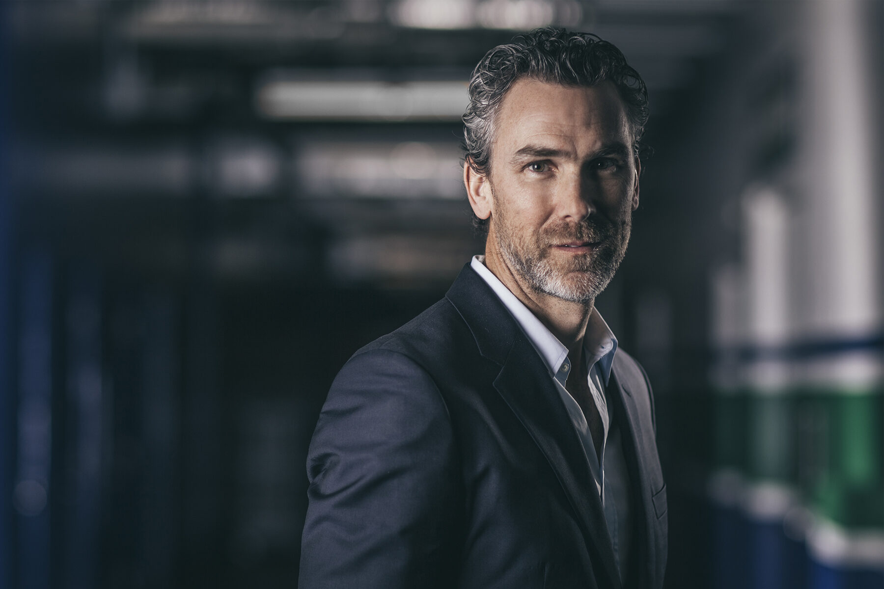 Executive portrait, dark background
