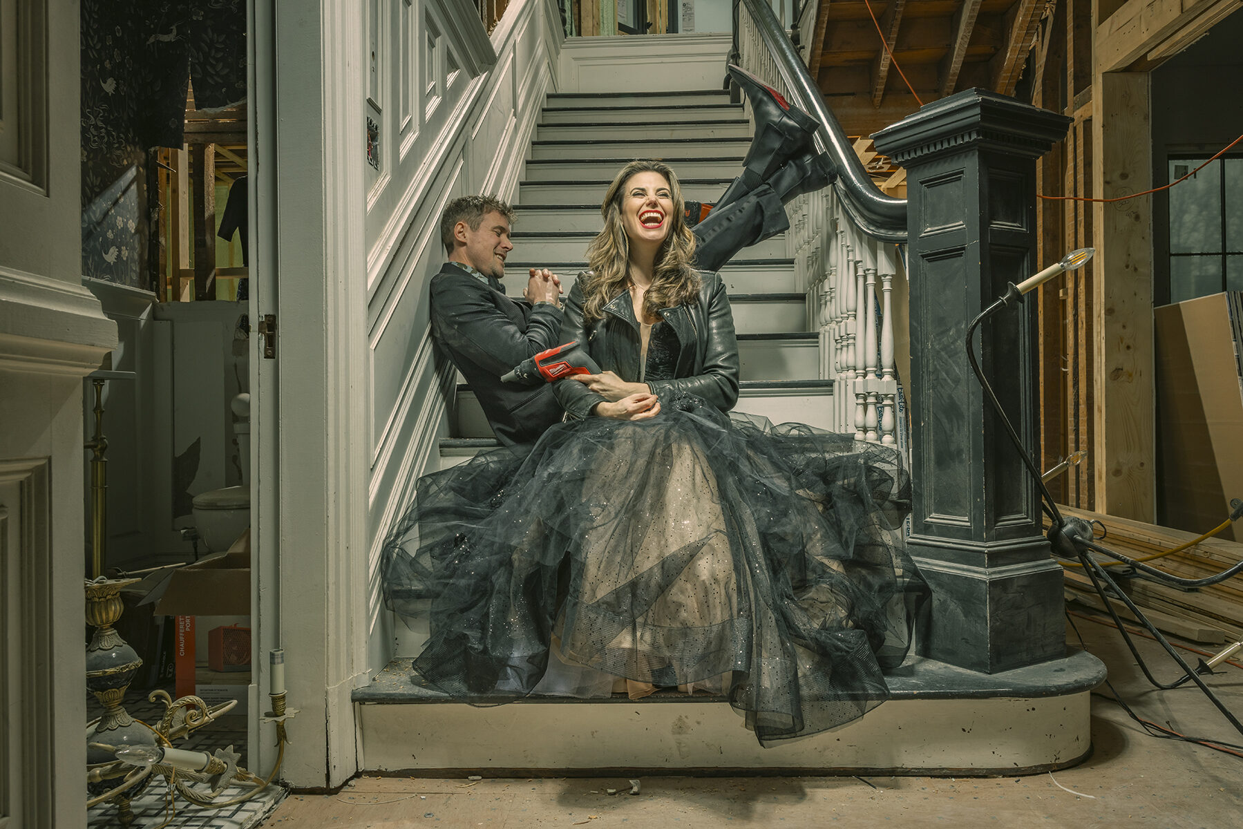 Couple on renovation staircase